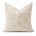 Cojín decorativo cuadrado 45 cm de tela beige con bordado en relieve estilo botánico