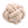 Cojín decorativo redondo 30 cm de felpa sintética beige con nudo